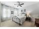 Comfortable bedroom with lots of natural light and a ceiling fan at 4010 Cameron Ct, Cumming, GA 30040