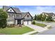 Charming brick home boasts a manicured lawn, two-car garage, and inviting curb appeal at 4010 Cameron Ct, Cumming, GA 30040
