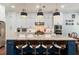 Modern kitchen with granite countertops, stainless steel appliances, and a breakfast bar at 4010 Cameron Ct, Cumming, GA 30040