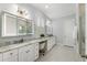 Luxurious bathroom with marble countertops, modern fixtures, and vanity at 4010 Cameron Ct, Cumming, GA 30040