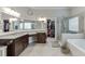 Bathroom with double sink, vanity with granite countertop, and glass shower at 470 Wagon Hill Ln, Sugar Hill, GA 30518