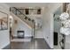 Inviting foyer with hardwood floors, staircase, and decorative accents, providing a warm welcome at 470 Wagon Hill Ln, Sugar Hill, GA 30518