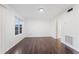 A bright and open living room with hardwood flooring and a neutral color scheme at 3775 Reston Ln, Decatur, GA 30034
