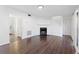 A bright living room features a fireplace and hardwood floors, with access to other rooms at 3775 Reston Ln, Decatur, GA 30034