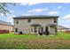 Wide backyard with grill and patio seating at 397 Victory Ln Ln, Locust Grove, GA 30248