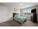 Cozy bedroom featuring natural light from the window and a relaxing atmosphere at 397 Victory Ln Ln, Locust Grove, GA 30248