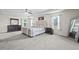 Spacious main bedroom with luxurious furnishings, natural light, and ample space at 397 Victory Ln Ln, Locust Grove, GA 30248
