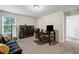 Spacious office area featuring a comfortable workspace and natural light at 397 Victory Ln Ln, Locust Grove, GA 30248