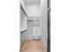 A well-organized walk-in closet offers custom white shelving and storage solutions at 4927 Slaton Dr, Acworth, GA 30101