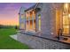 Outdoor brick kitchen with built-in grill and bar, offers a luxurious setting for entertaining and enjoying outdoor meals at 4927 Slaton Dr, Acworth, GA 30101