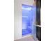 Sleek, modern shower with a glass door and recessed lighting, complementing the gray cabinets at 4927 Slaton Dr, Acworth, GA 30101