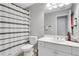 Classic bathroom with a shower-tub combo and modern vanity with plenty of counter space at 620 Neel Reid Dr, Roswell, GA 30075