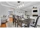 Open dining room with hardwood floors, modern lighting and an open floor plan at 620 Neel Reid Dr, Roswell, GA 30075
