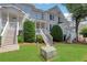 Charming townhouse exterior with manicured lawn and inviting entrance at 620 Neel Reid Dr, Roswell, GA 30075
