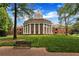 Stately brick building with a prominent dome, surrounded by well-manicured lawn at 620 Neel Reid Dr, Roswell, GA 30075
