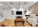 Stylish living room with modern fixtures, including hardwood floors and coffered ceilings at 620 Neel Reid Dr, Roswell, GA 30075