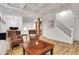 Spacious living room with coffered ceilings, hardwood floors, and ample natural light at 620 Neel Reid Dr, Roswell, GA 30075
