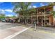 Restaurant outdoor seating with two story building and multiple tables at 620 Neel Reid Dr, Roswell, GA 30075