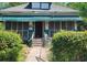 Charming single-story home with a porch, offering a cozy curb appeal in a mature neighborhood at 901 Mayson Turner Nw Rd, Atlanta, GA 30314