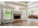 Living room showcasing the fireplace and the breakfast nook at 130 Stewart Hollow Ln, Covington, GA 30016