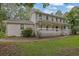 Charming two-story home with a large, covered front porch and well-maintained lawn at 2055 Pinella Dr, Grayson, GA 30017