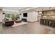 Finished basement with seating area, game area, and wet bar at 4304 Berkford Ne Cir, Brookhaven, GA 30319