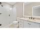 Bathroom featuring granite counters, tile flooring, and a glass door shower at 4304 Berkford Ne Cir, Brookhaven, GA 30319
