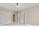 Bedroom with multiple closets and neutral tones, creating a calm ambiance at 4304 Berkford Ne Cir, Brookhaven, GA 30319