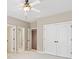 Bedroom with multiple closets and neutral tones, creating a calm ambiance at 4304 Berkford Ne Cir, Brookhaven, GA 30319