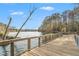 Scenic boardwalk over a tranquil lake, perfect for a relaxing stroll in a natural setting at 4304 Berkford Ne Cir, Brookhaven, GA 30319