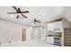 Bonus room with dual ceiling fans, mini bar, and recessed lighting at 4304 Berkford Ne Cir, Brookhaven, GA 30319