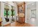 Butler's pantry with glass door to covered patio and swimming pool at 4304 Berkford Ne Cir, Brookhaven, GA 30319