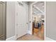 Open entryway revealing a view of the kitchen and living room with coffered ceilings at 4304 Berkford Ne Cir, Brookhaven, GA 30319