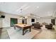 A basement game room with a pool table, seating area, and entertainment options at 4304 Berkford Ne Cir, Brookhaven, GA 30319