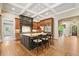 Spacious kitchen features a large island and coffered ceilings at 4304 Berkford Ne Cir, Brookhaven, GA 30319
