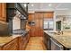 Gourmet kitchen featuring high-end appliances, custom cabinetry, and granite countertops at 4304 Berkford Ne Cir, Brookhaven, GA 30319