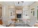 Cozy living room includes a stone fireplace and built-in bookcases at 4304 Berkford Ne Cir, Brookhaven, GA 30319
