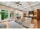 Bright living area with backyard view connects dining and kitchen at 4304 Berkford Ne Cir, Brookhaven, GA 30319