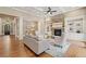 Open-concept living room with hardwood floors and coffered ceilings at 4304 Berkford Ne Cir, Brookhaven, GA 30319