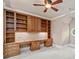 Home office with built-in desk and cabinets at 4304 Berkford Ne Cir, Brookhaven, GA 30319