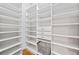 Walk-in pantry provides ample storage with custom shelving and drawers at 4304 Berkford Ne Cir, Brookhaven, GA 30319