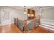 A view of the staircase leading to a bonus room with built-in features at 4304 Berkford Ne Cir, Brookhaven, GA 30319