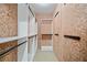 Walk-in closet with custom shelving and hanging racks providing ample storage space at 4304 Berkford Ne Cir, Brookhaven, GA 30319
