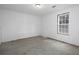 Unfinished basement with a window and concrete floor at 5 Glenn Eagles Vw, Hiram, GA 30141