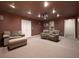 Finished basement with a projector, two couches, and recessed lighting at 5 Glenn Eagles Vw, Hiram, GA 30141