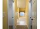 Hallway view of the bathroom featuring a large soaking tub and separate walk-in closet at 5 Glenn Eagles Vw, Hiram, GA 30141