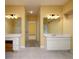Bathroom featuring double vanities and an entry to the water closet at 5 Glenn Eagles Vw, Hiram, GA 30141