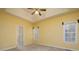 Spacious bedroom featuring neutral carpet and a ceiling fan for added comfort at 5 Glenn Eagles Vw, Hiram, GA 30141