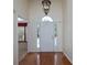 Bright foyer featuring hardwood floors, a chandelier, and a view into adjacent rooms at 5 Glenn Eagles Vw, Hiram, GA 30141