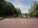 Enjoy lush golf course views from the wooden deck surrounded by mature trees at 5 Glenn Eagles Vw, Hiram, GA 30141